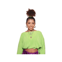 a young woman in a green top and purple skirt